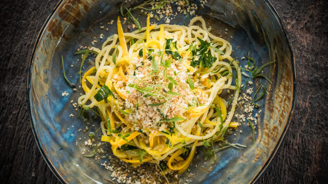 Spaghetti with yellow courgette, baby spinach and wild wild garlic, Motti Cress and toasted bread crumble