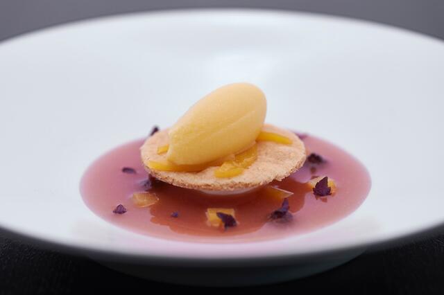 Hand-made mascarpone, yellow peach with Shiso Purple and hazelnut sablé