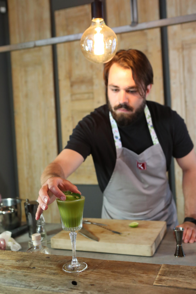 Stijn is putting the finishing touches on the Matcha Gimlet