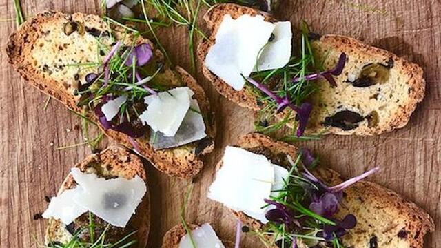 Mixed olive biscotti with cress
