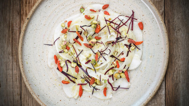 Ripe pear and fennel carpaccio, pink grapefruit, pistachio, goji berry and Yka Leaves