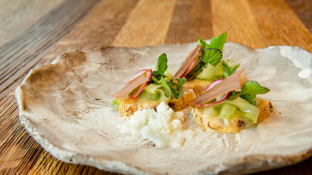 Marinated yellowfin mackerel, cucumber, buttermilk and Hippo Tops