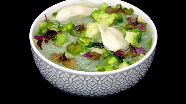Broccoli and dumpling noodle soup
