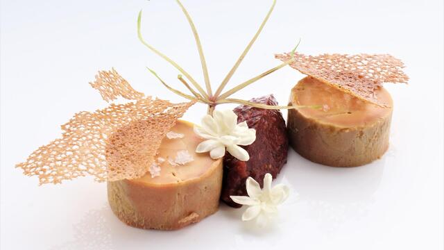 Foie gras au torchon with figs, Jasmine Blossom and Aikiba Leaves